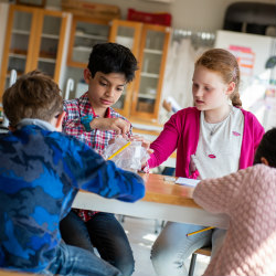 Grade 5 children doing a science experiment