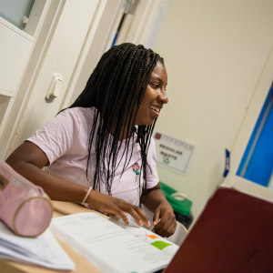 Smiling girl at laptop